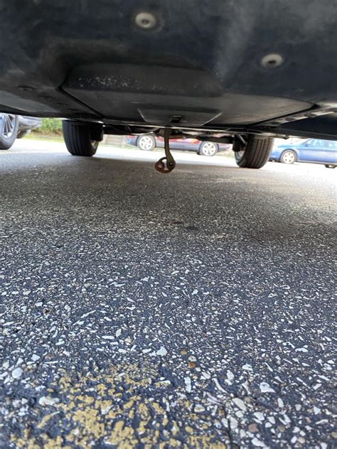 metal sheet hanging under car|metal hanging under car.